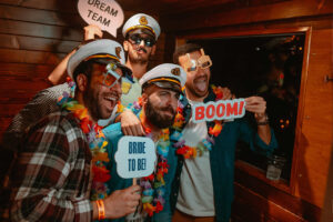 Party props and captain's hats on the boat